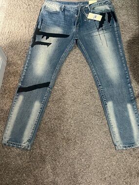 Blue Distressed Men’s Slim Fit Jeans with Black Graphic Accents